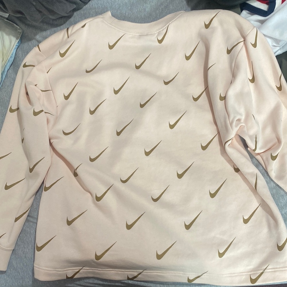 Oversized pink and gold Nike crewneck